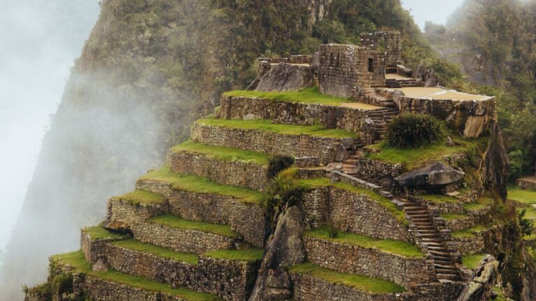 Panoramic view of the Machu Picchu citadel and terraces visited on a one-day trip from Cusco Peru (machu picchu in one day from cusco) | Viajes Peru Tour